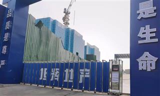 洛阳旭辉地产不锈钢封板伸缩门工程